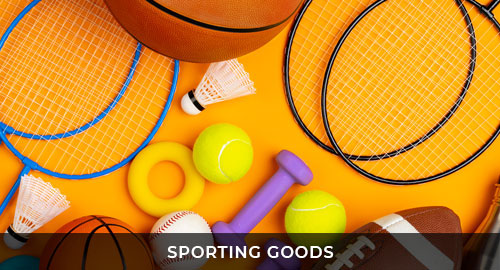 Sporting goods equipment on orange floor.