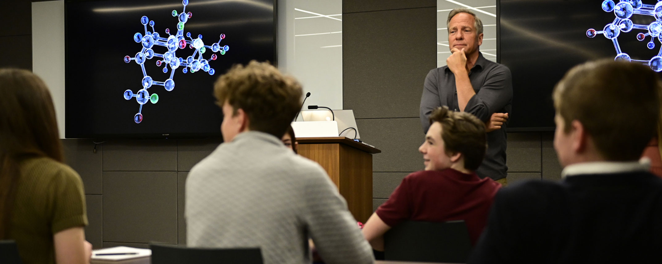 Mike Rowe presenting to students in the classroom