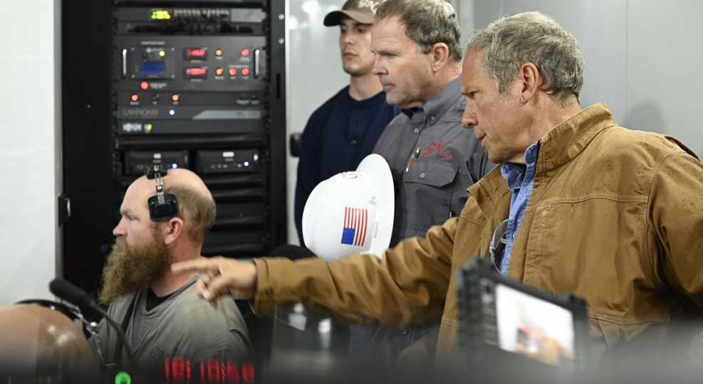 Mike Rowe with operations technicians