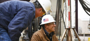 Mike Rowe with technician