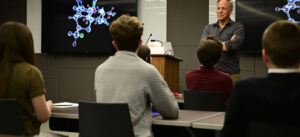 Mike Rowe in classroom with students