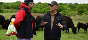 Mike Rowe with farmer