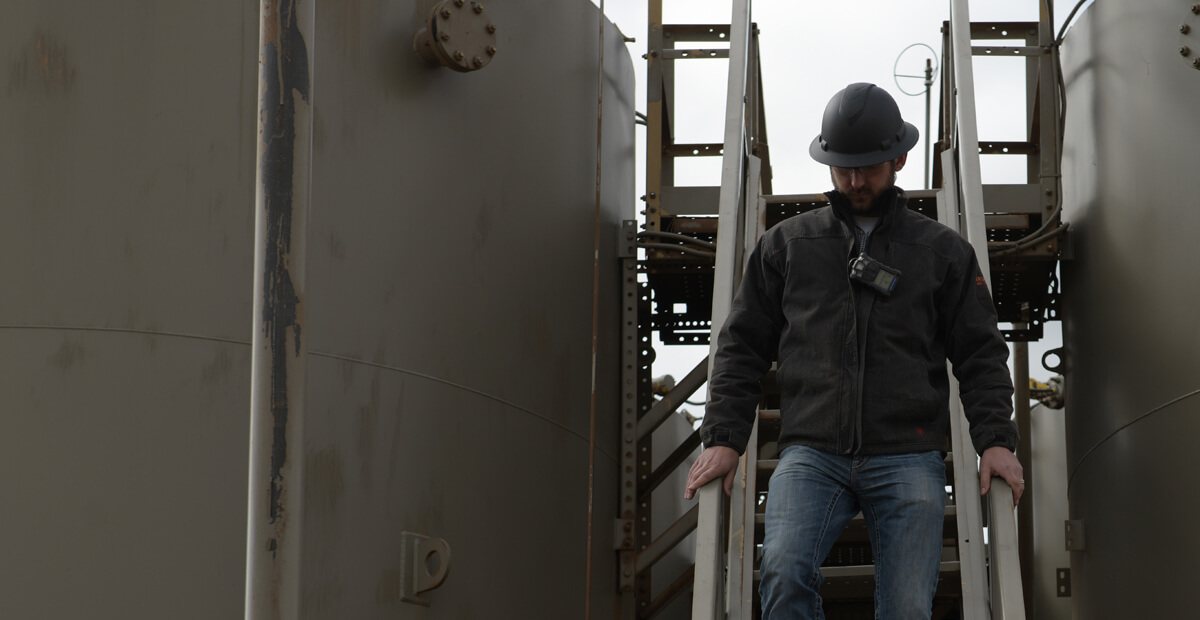 Technician descending stairs