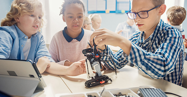 Children working with robotics project