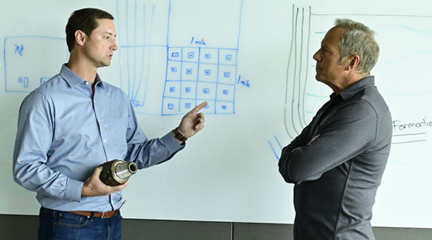 Mike Rowe with a scientist